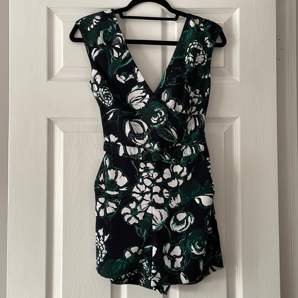 Floral jumpsuit with open tie back.